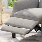 Fauteuil inclinable gris en tissu de style Mid-Century avec oreilles, mécanisme à poussoir, repose-pieds et dossier capitonné.