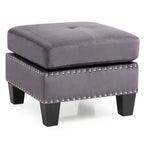 Pouffe en velours capitonné