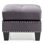 Pouffe en velours capitonné